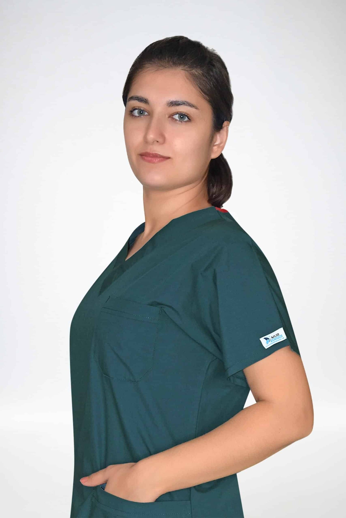 მუქი მწვანე ტერიკოტონის ზედა და ქვედა ნაწილების ნაკრები